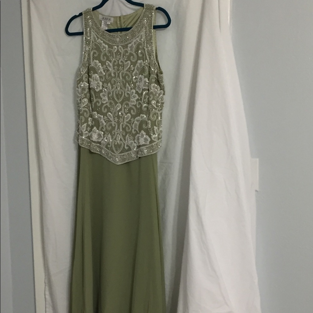 J Kara beaded overlay with traditional back.  Formal size 12 NWT